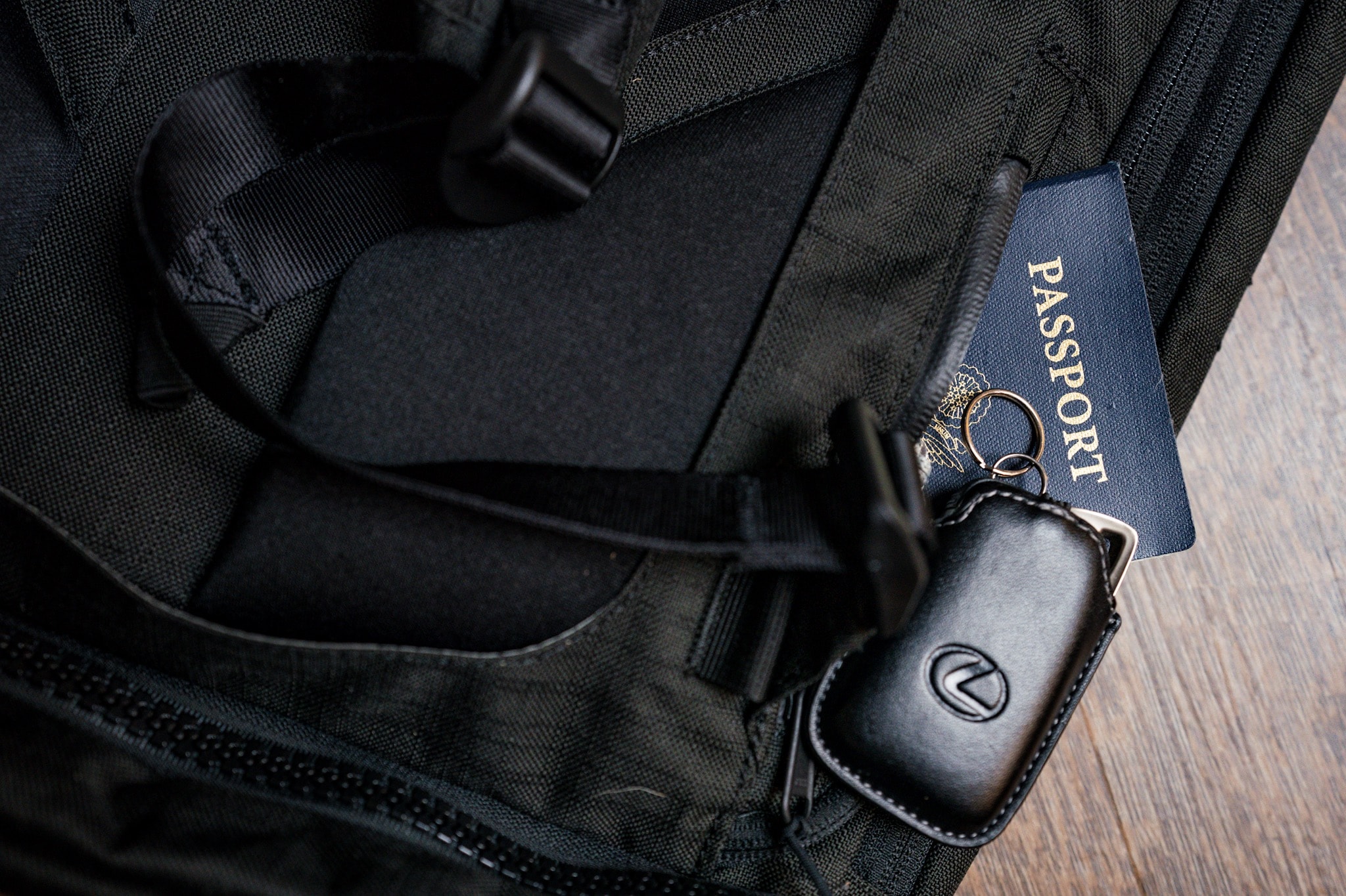 Passport and Lexus car keys in backpack